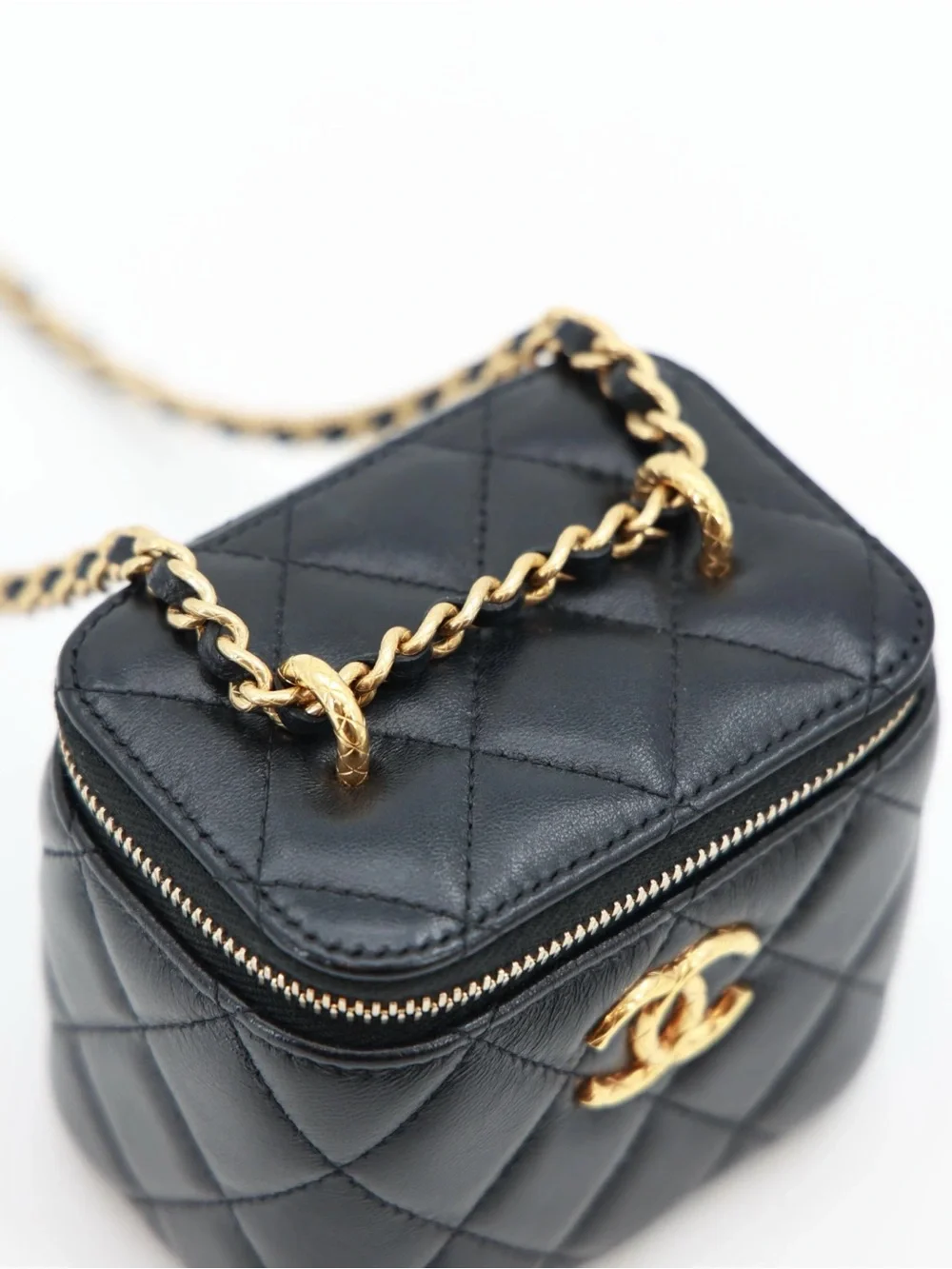 CHANEL Black Quilted Lambskin Mini Vanity Case with Gold Carving CC